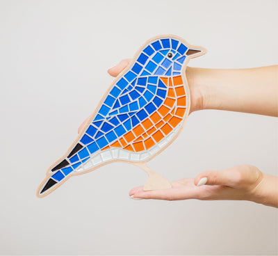 DIY glass mosaic silhouette of a bluebird 