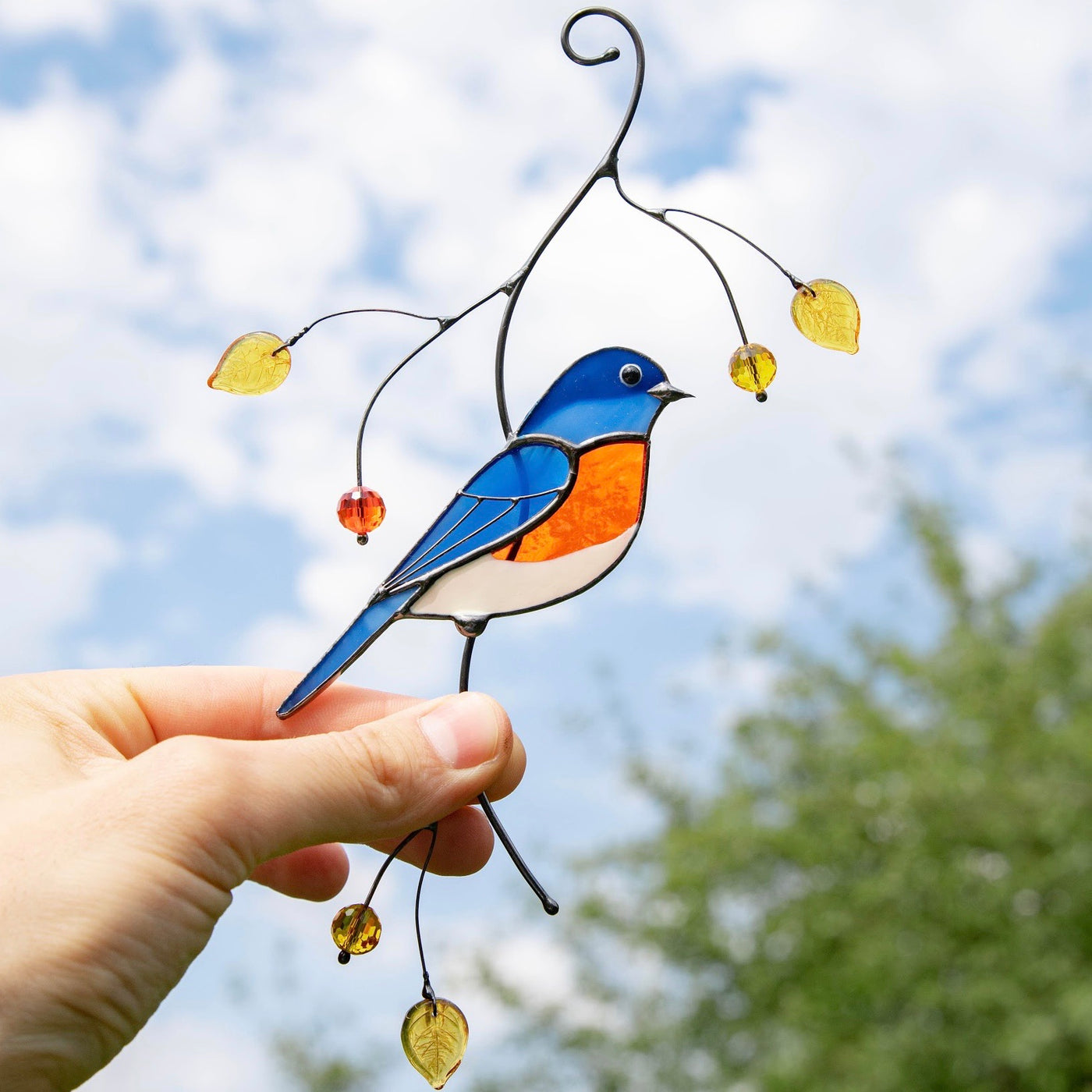 Bluebird sitting on the branch stained glass suncatcher
