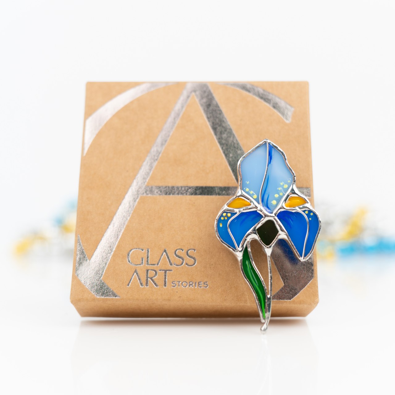 Handmade bluish iris brooch of stained glass